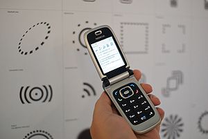 An NFC mobile phone (Nokia 6131 NFCmesso) inte...