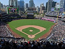 View of a baseball stadium, taken from the upper deck and looking out over the field.