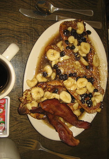 Bananas Foster French toast with bacon. Ruby S...