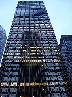 The facade of the Union Carbide Building at 270 Park Avenue, a glass-and-metal tower, as seen from Park Avenue