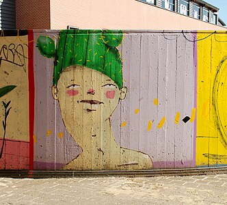 Jeune homme au bonnet vert.