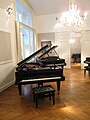 Request: Stitch into pano (see file description for second image). Upload as new file Taken by: Keraunoscopia New file: Bösendorfer display room (panorama).jpg