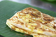 The final presentation of Roti Canai on banana leaf