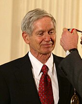 Charles Keeling, receiving the National Medal of Science from George W. Bush, in 2001 Charles David Keeling 2001.jpg