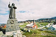 Statue of Hans Egede in the foreground with Nuuk Cathedral in the background