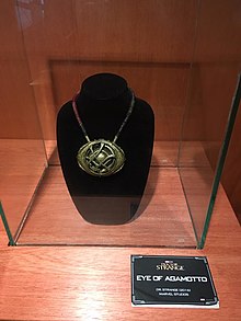 Official prop of the MCU Eye of Agamotto on display at an exhibition