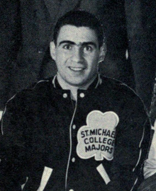 Black and white photo of Jim Gregory wearing a Toronto St. Michael's Majors jacket