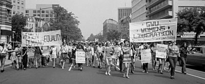 The women's liberation movement featured political activities such as a march demanding legal equality for women in the United States (26 August 1970) Leffler - WomensLib1970 WashingtonDC (cropped).jpg