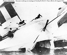 Rescuers scramble across the wreckage of British R-38/USN ZR-2 airship, 24 August 1921. R-38-rescue.jpg