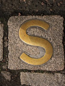 Sanctuary marker (S) at Holyrood Abbey, Royal Mile, Edinburgh Sanctuary marker for Holyrood Abbey, Royal Mile, Edinburgh.jpg