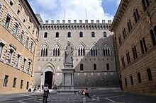 Banca Monte dei Paschi di Siena, founded in 1472, is the world's oldest or second oldest bank in continuous operation. Siena, Piazza Salimbeni (Bank Monte dei Paschi di Siena) (38588876202).jpg