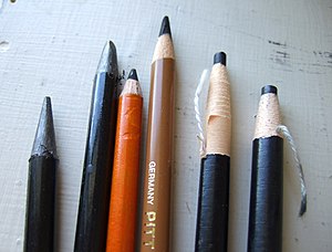2 woodless graphite pencils in plastic sheaths...