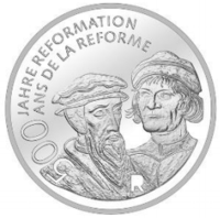 Zwingli (kanan) dan John Calvin di koin 20 franc Swiss memperingati ulang tahun ke-500 Reformasi, 2017.