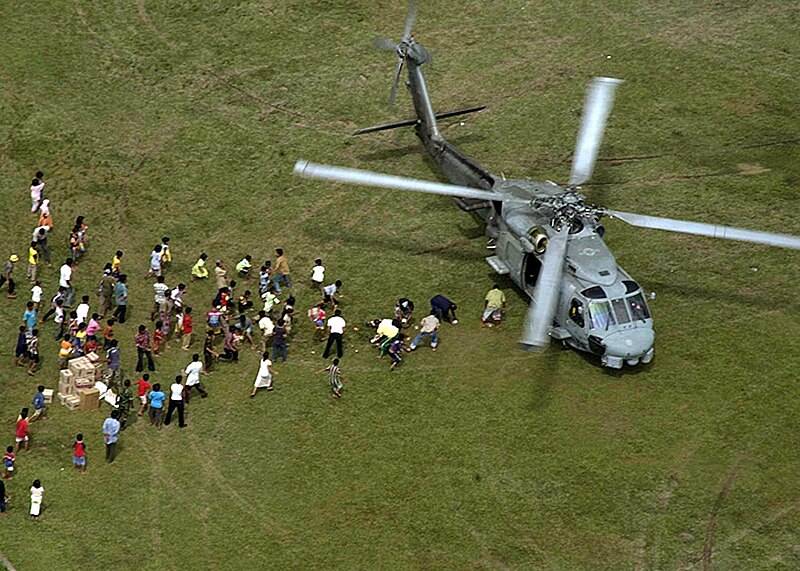 File:US Navy 050116-N-3823K-133 An SH-60B Seahawk helicopter lands to drop off relief supplies to Tsunami victims on the island of Sumatra, Indonesia.jpg