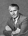 Wernher von Braun, who co-developed the V-2 rocket, the first artificial object to travel into space. Described by others as the "father of space travel",[68] the "father of rocket science",[69] or the "father of the American lunar program".