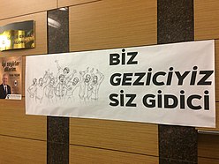 Banner about Gezi Park protest, 2022: "We are traveller ("Gezi"ci), you are goner" Biz Geziciyiz Siz Gidici-pankart, Nazim Hikmet Kultur Merkezi(Yenimahalle Belediyesi).jpg