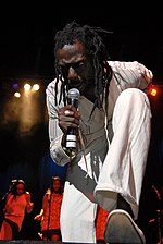 Buju Banton, a Jamaican musician, performing in 2007 Buju Banton (Apollo theater, 2007).jpg