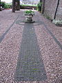 Celtic cross stone sett detail in the garden designed by Cheryl Cummings MSGD (RHS Medal winner)