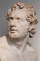 Spremljevalec Odiseja ("nosač vinskega meha") v Britanskem muzeju; prsi, nos in ustnice so restavrirani.