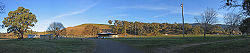 Panoramic 180° view of the Ensay Recreation Reserve. From left: public toilets, lawn bowls club and green, tennis and netball courts and clubrooms, football changerooms and clubrooms, playground, football oval