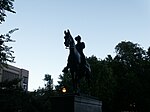 Statue of Teddy Roosevelt with the Oregon Historical Society Museum in the background