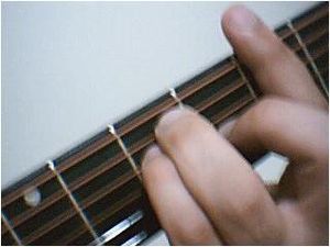 Picture taken from taking barre chord on guitar.