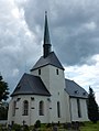 Kirche mit Ausstattung, Kriegerdenkmal für die Gefallenen des Ersten Weltkrieges, fünf Soldatengräber Zweiter Weltkrieg, vier Gräber für Pfarrer (Julius Theodor Dittrich, Ernst Kurt Jahn, Johannes Fürchtegott Kretzschmar, Gottlieb Ehrenreich Gröschen), kleiner nicht mehr lesbarer Grabstein und Kirchhofsmauer (Einzeldenkmale der Sachgesamtheit 09244439)