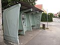 Concrete bus stop shelter