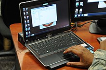 Latitude XT3 with dock Laptops for students 130618-A-WF509-002.jpg