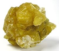 Yellow lepidolite from Itinga, Minas Gerais, Brazil. Size: 6.1 x 4.9 x 3.1 cm