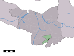 The village centre (dark green) and the statistical district (light green) of Zuiddorpe in the municipality of Terneuzen.