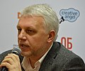 Novinář Pavel Šeremet zahynul v Kyjevě v červenci 2016 po explozi automobilu[2]