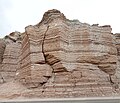 Evenly bedded Summerville Formation exposed along Utah Highway 24, 2.4 miles west of Hanksville, Utah