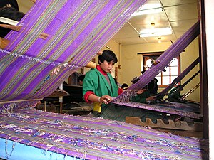 English: Students learning weaving Khaling, Bh...