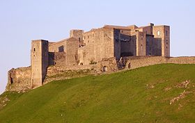 The stone castle at Melfi was constructed by the Normans where no fortress had previously stood. The present castle includes additions to a simple, rectangular Norman keep. Castello di melfi1.JPG