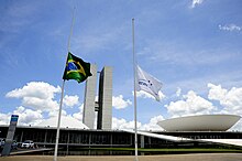 The Brazilian flag flying at half-mast beside the Mercosul flag in front of the National Congress of Brazil in memory of the victims of the Chapecoense crash on 29 November 2016 Chapecoense - Bandeiras a meio mastro.jpg