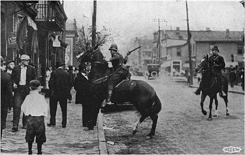 Cossacks in action unprovoked assault upon individual during the Great Steel Strike of 1919.jpg