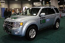 The Ford Escape Hybrid was the first hybrid electric vehicle with a flex-fuel engine capable of running on E85 fuel. Escape E85 Flex Fuel Hybrid WAS 2010 8941.JPG