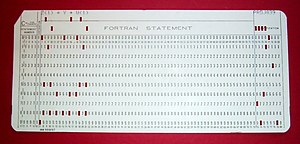 A 1970s punched card containing one line from a FORTRAN program. The card reads: "Z(1) = Y + W(1)" and is labelled "PROJ039" for identification purposes.