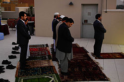 Afghan politicians and foreign diplomats praying at the U.S. Embassy in Kabul. Muslim men praying in Afghanistan-2010.jpg