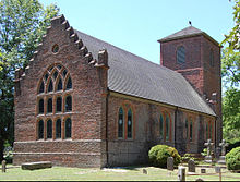 St. Luke's Church, built during the 17th century near Smithfield, Virginia - the oldest Anglican church-building to have survived largely intact in North America. Newport parish west facade.jpg