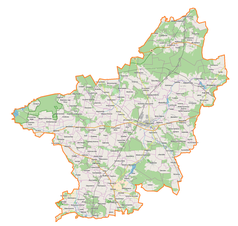 Mapa konturowa powiatu opoczyńskiego, na dole po prawej znajduje się punkt z opisem „Petrykozy”