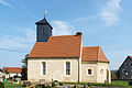 Kirche mit Ausstattung, Kirchhof und Einfriedungsmauer sowie Denkmal für die Gefallenen des Ersten Weltkrieges