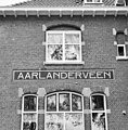 Aarlanderveen station tile sign