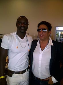 Anand Raaj Anand (right) with Akon in 2014
