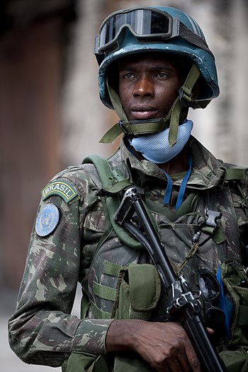 A Brazilian soldier stands security in Port-au...