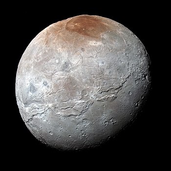 Plutův měsíc Charon, tmavá oblast v okolí severního pólu je nazývána Mordor