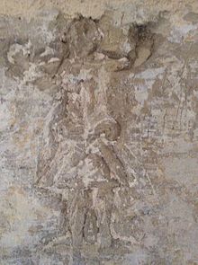 Figure graffito, similar to a relief, at the Castellania, in Valletta Graffitti, Castellania, Malta.jpeg