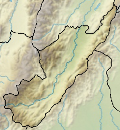 Mapa konturowa Huila, po lewej nieco u góry znajduje się czarny trójkącik z opisem „Nevado del Huila”