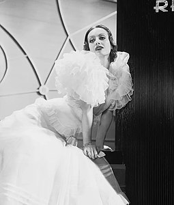 Joan Crawford in the 1932 film Letty Lynton, wearing the influential chiffon dress by Adrian that created a craze for similar designs.